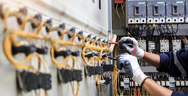Professional Electrician technician working in Seven Fields, PA